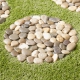 کف سازی با سنگ رود خانه ای در طراحی فضای سبز